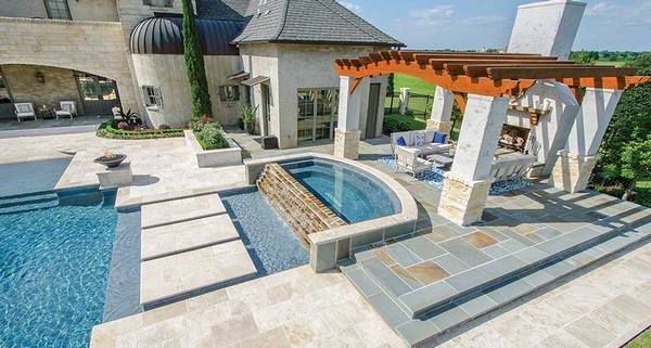 outdoor swimming pool pergola stone paving