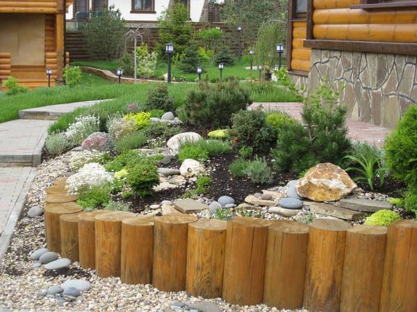 Inexpensive Retaining Wall Ideas Creative Landscape Designs - Log Retaining Wall Construction