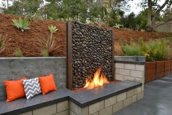 concrete garden walls and fireplace patio design ideas