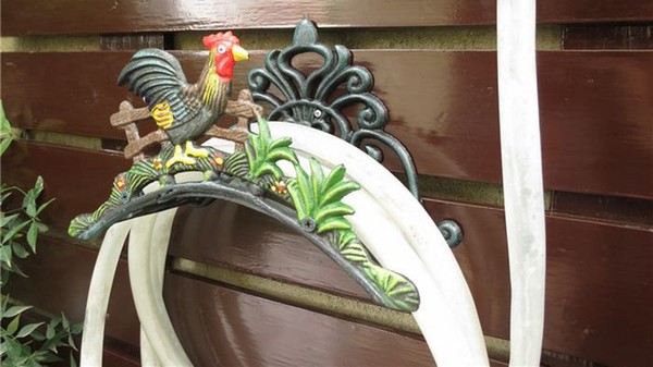 decorative wall mounted garden watering hose holder