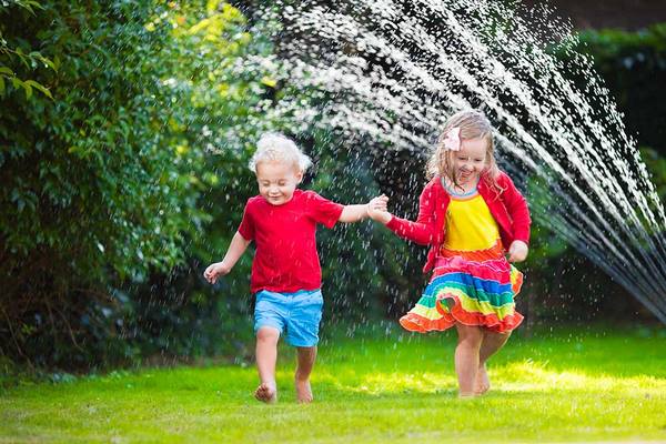 garden fun with watering hoses sprinklers