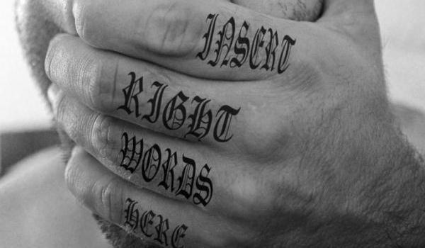 words finger tattoo for men