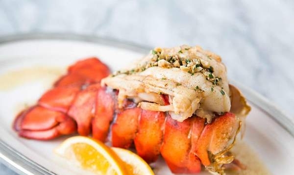 broiled lobster tail with butter and herbs