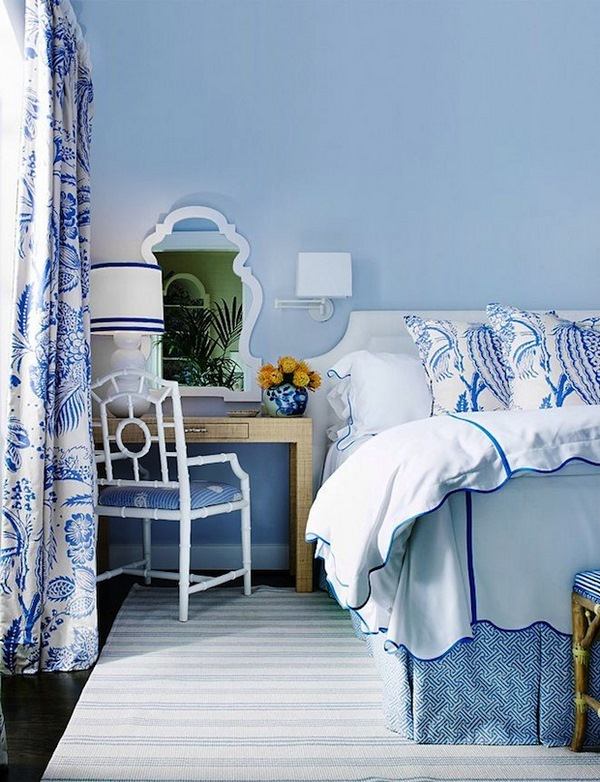 blue and white interior design in stylish bedroom