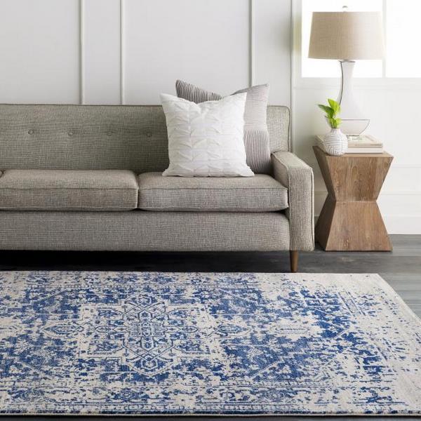 beautiful vintage rug in modern living room gray sofa