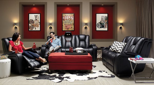 black living room furniture red wall accents cowhide rug