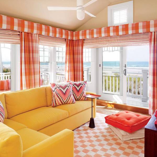 bright and light living room interior in orange and yellow