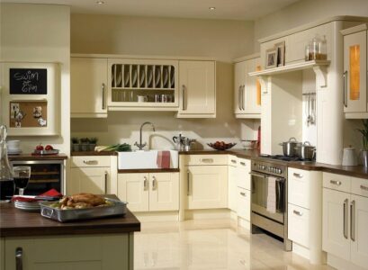 contemporary-vanilla-cream-kitchen-cabinets-tile-flooring-stainless-steel-appliances