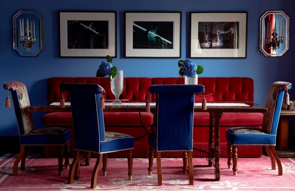 dining room interior blue walls dark red sofa upholstered chairs