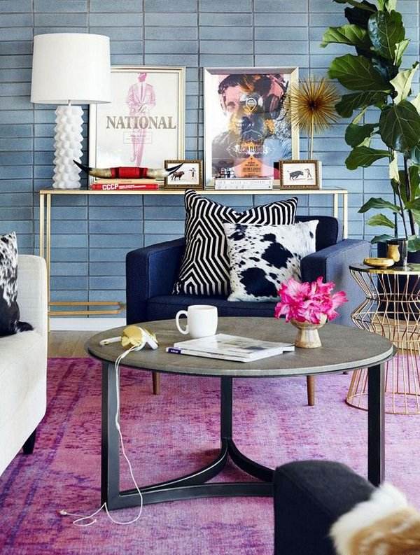 eclectic interior with antique rug round coffee table 