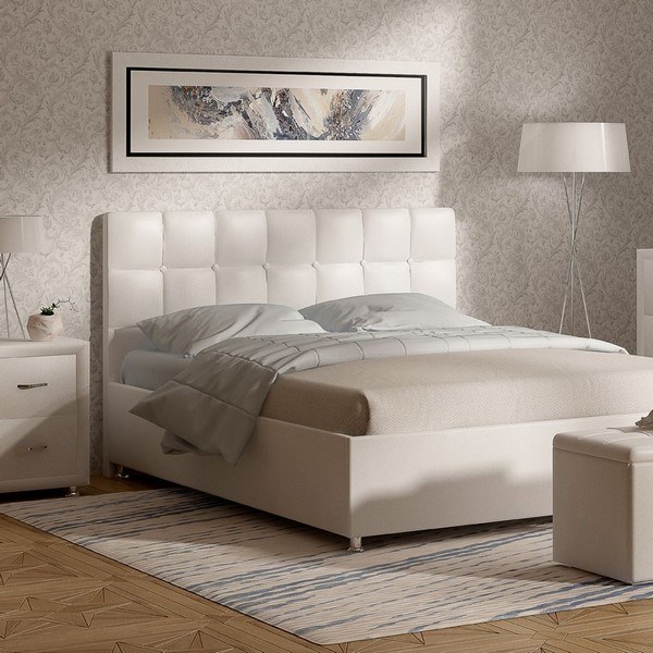 modern bedroom with white upholstered bed wood flooring neutral colors