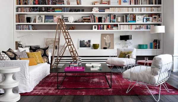 modern living room with antique overdyed rug white furniture