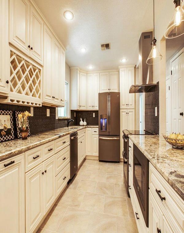 off white colors vanilla kitchen cabinets with granite countertops tile flooring