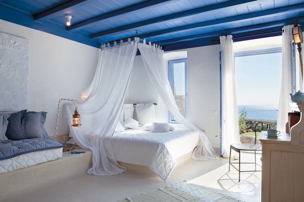 romantic bedroom interior design in white and blue