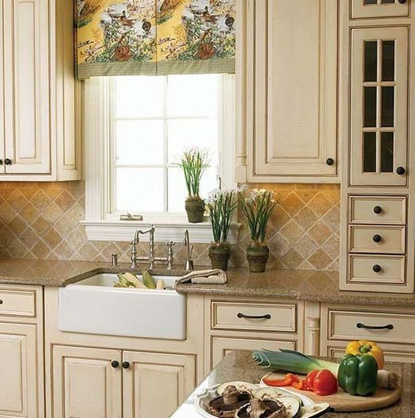 rustic kitchen vanilla color cabinets tile backsplash apron sink