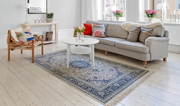 scandinavian living room vintage carpet on white wood flooring