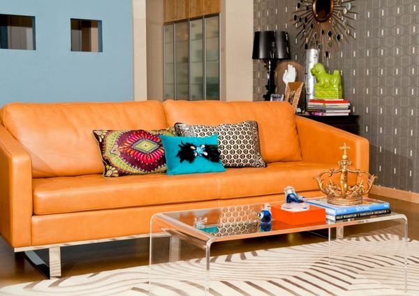 Orange leather sofa blue wall color living room interior design