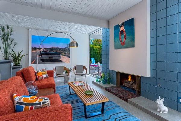 blue color in interior design ideas orange armchairs fireplace