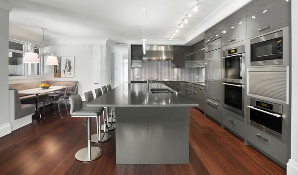 contemporary kitchens gray cabinets wood flooring bar stools