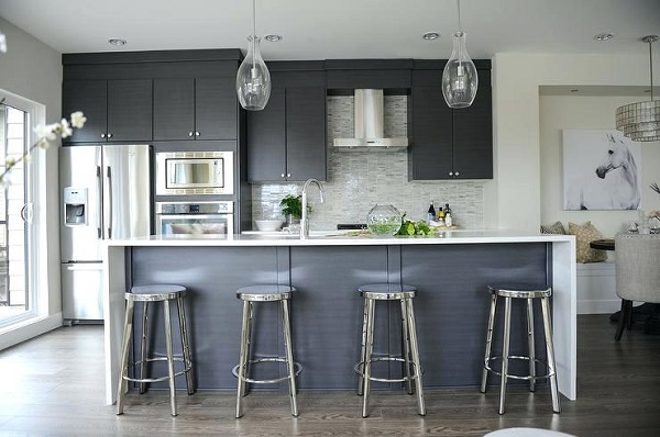 modern gray kitchen chrome counter stools wood flooring