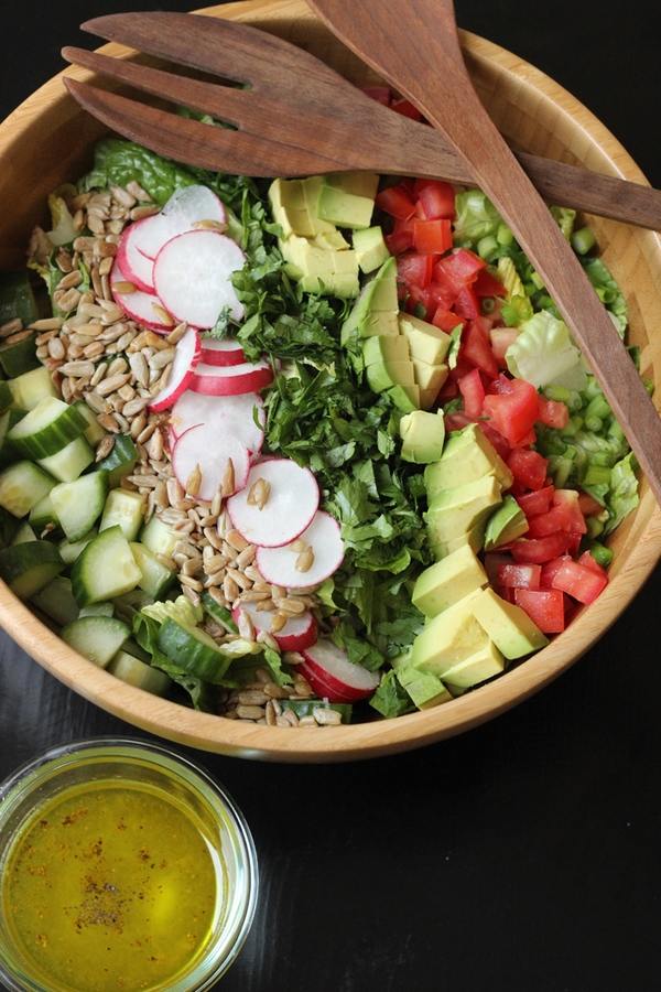vegan recipes salad with avocado raddish sunflower seeds