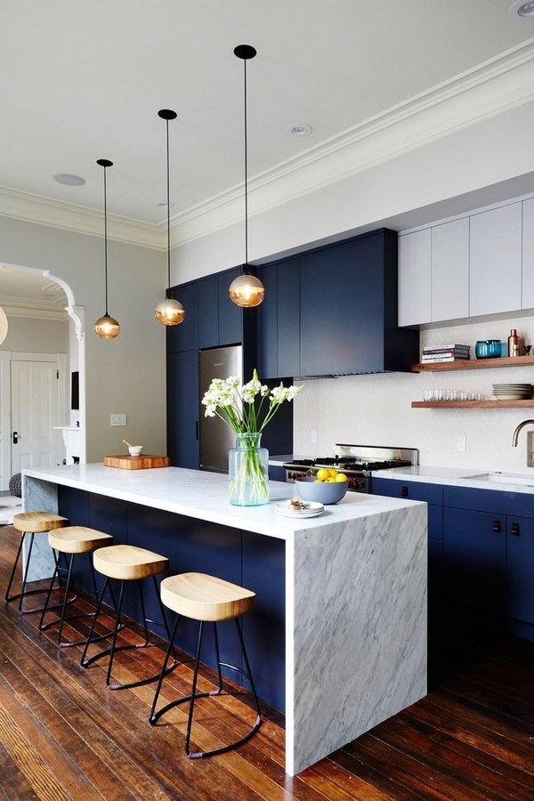 modern kitchen ideas dark blue cabinets marble waterfall countertop
