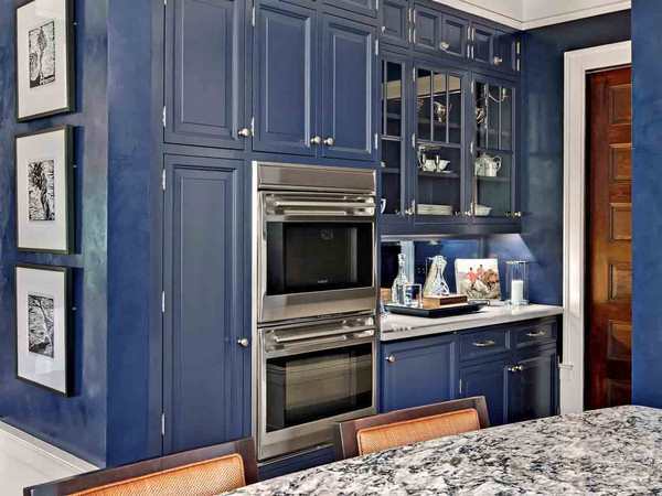 navy blue kitchen cabinets island with granite countertop