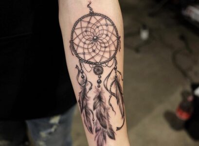 Dream-catcher-tattoo-for-arm-ideas-for-women-with-beads-feathers