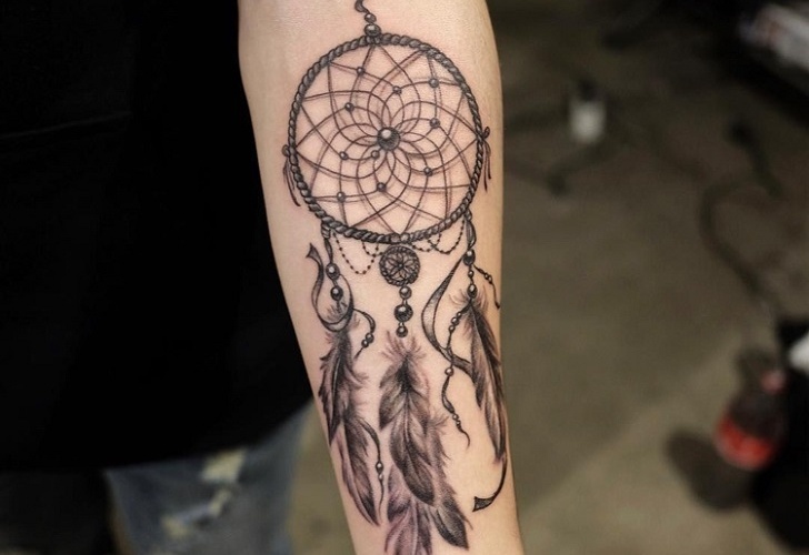 Discover the meaning of the mysterious dreamcatcher tattoo