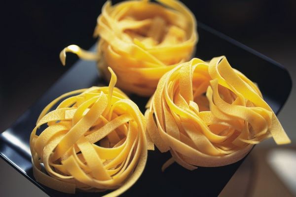Fettuccine long flat pasta Italian cuisine