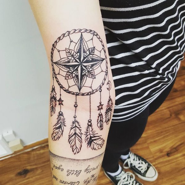 cool dream catcher and inscription tattoo for women