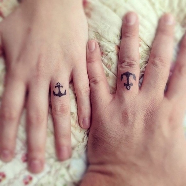 matching anchor tattoo design for couples on ring finger