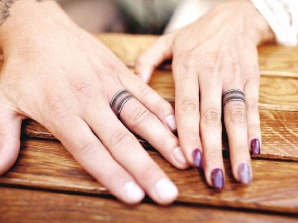 Super cool engagement and wedding ring tattoo ideas for couples