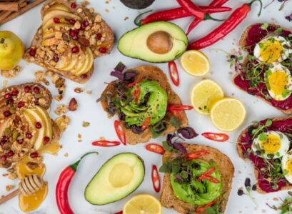 savory-vegan-breakfast-toast-avocado-honey-fruits