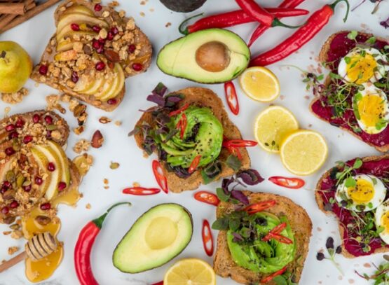 savory-vegan-breakfast-toast-avocado-honey-fruits
