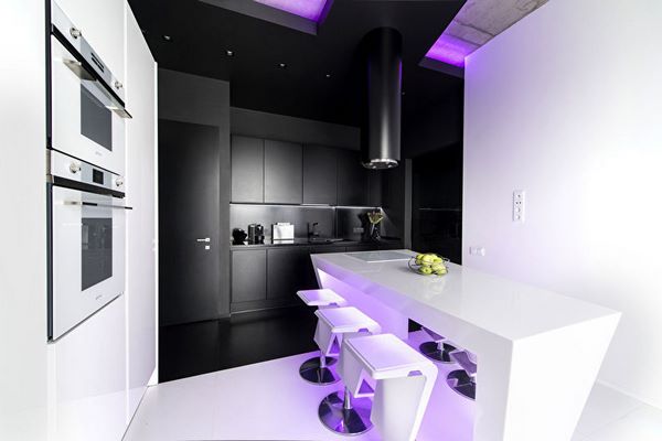 ultra modern high tech futuristic kitchen in black and white and LED lighting
