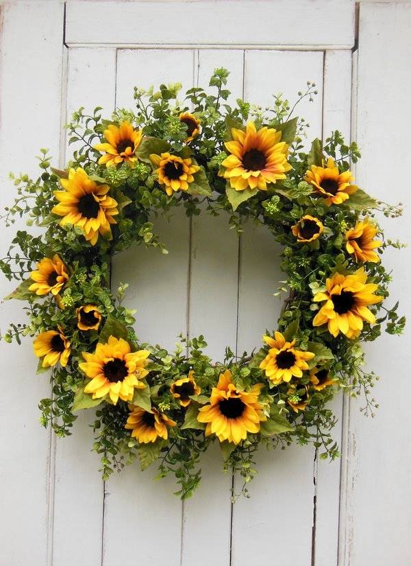 beautiful wreath with sunflowers and greenery for front door