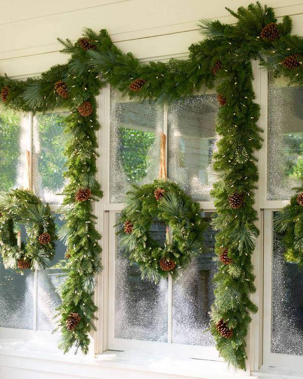 christmas window decor ideas wreaths and garlands evergreen with pinecones