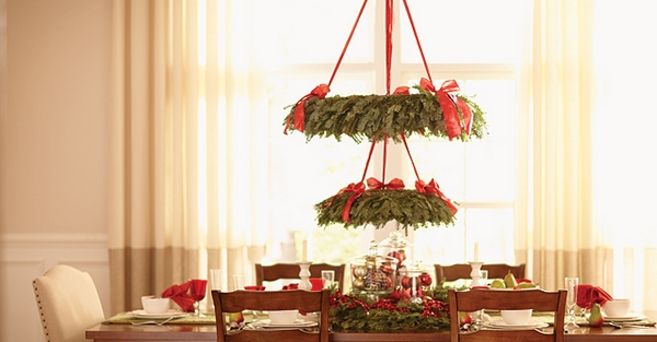 creative christmas decor ideas hanging wreaths chandelier red ribbons