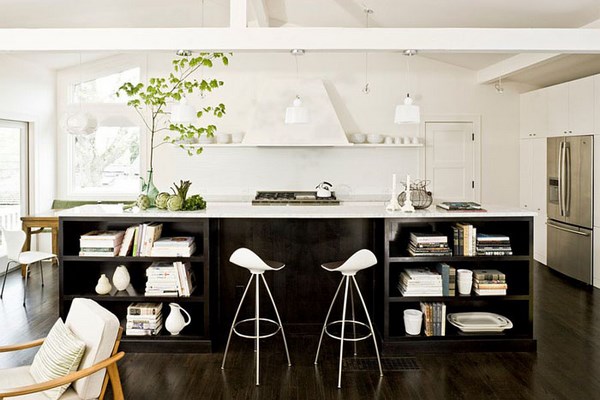 large black island with open shelving and seating