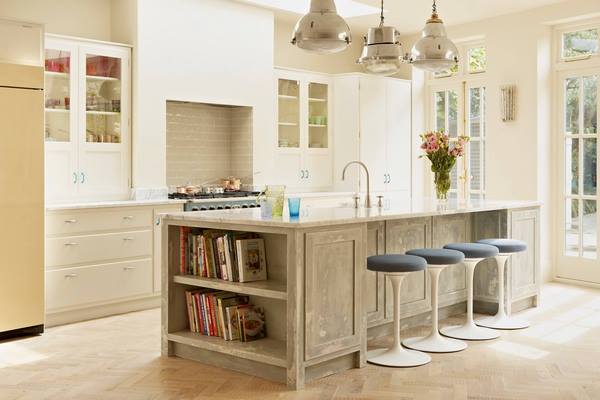 modern kitchen island with seating and open shelves