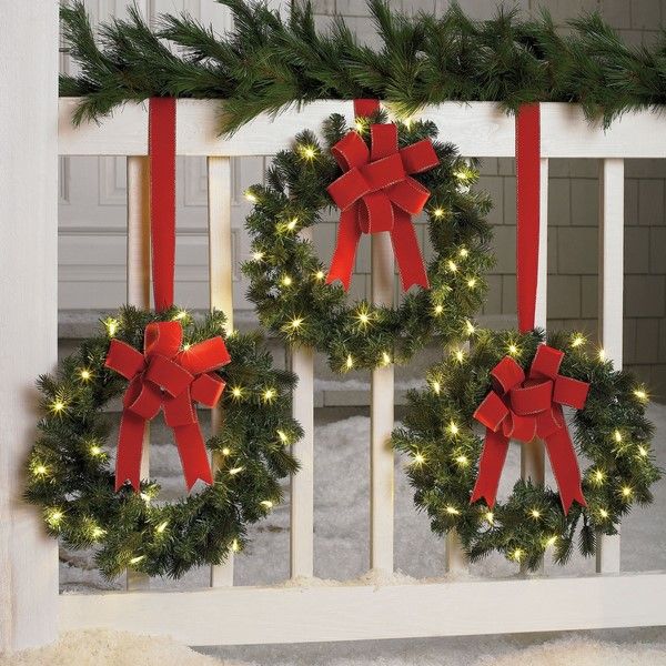 porch railing decorating ideas christmas wreaths with lights red bows