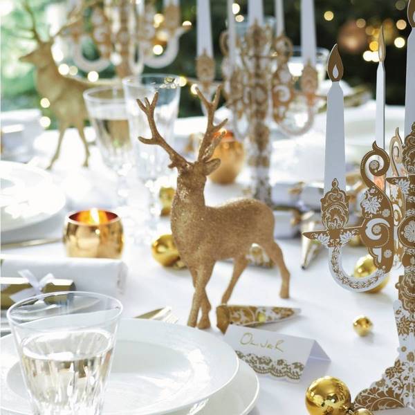 christmas table decoration in gold reindeer tree ornaments