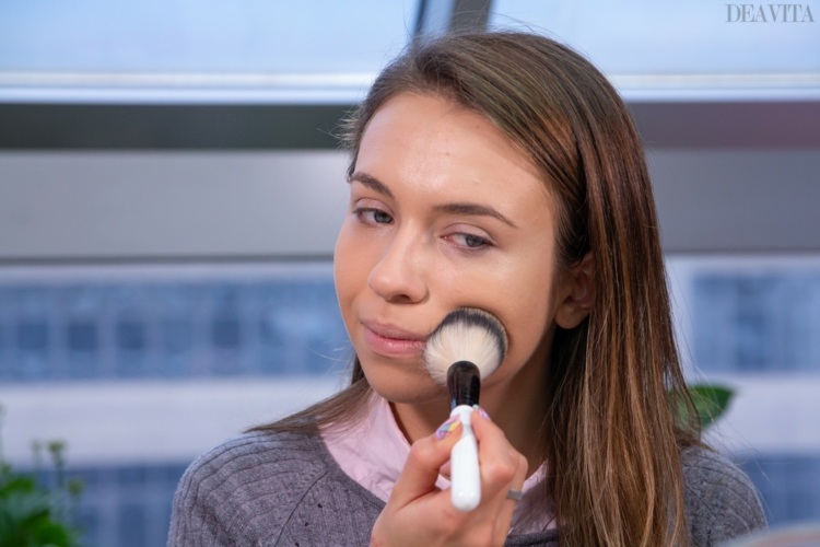 Apply setting powder with a big fluffy brush