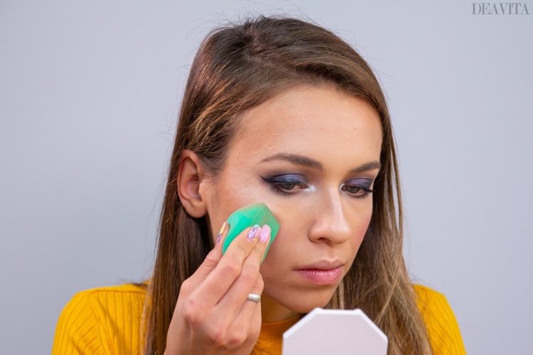 Blend highlighter and blush lightly with a makeup sponge