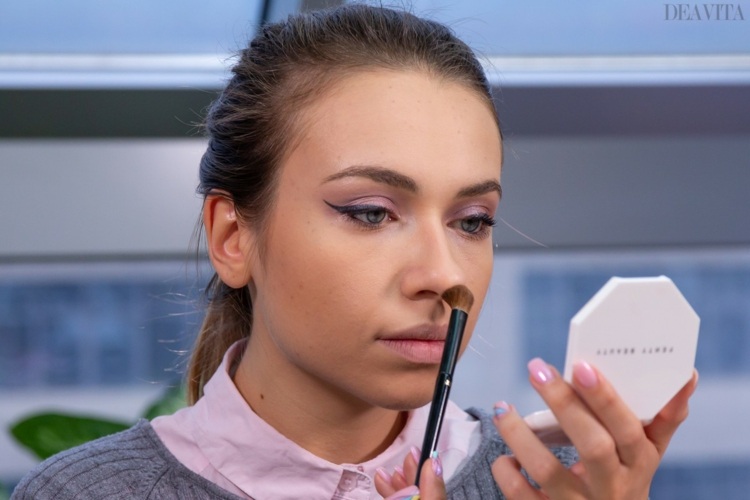 Contour the nose by applying powder