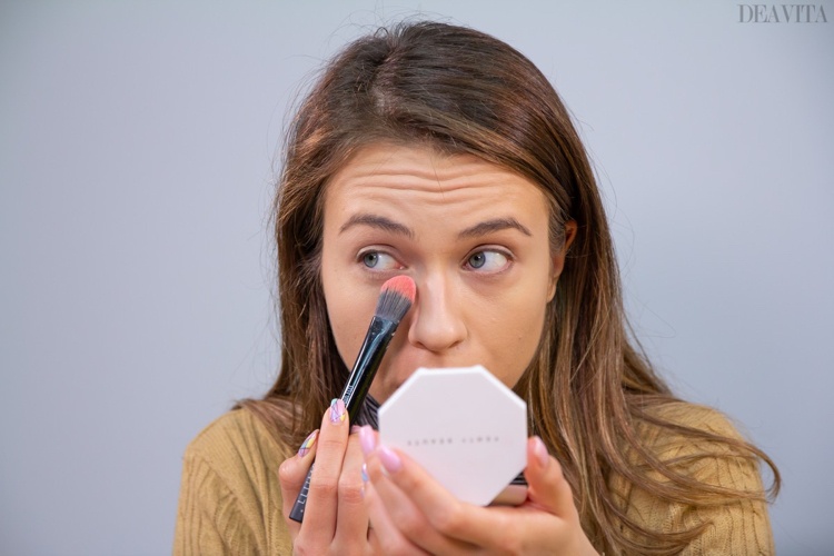 Set the concealer with powder and a flat foundation brush