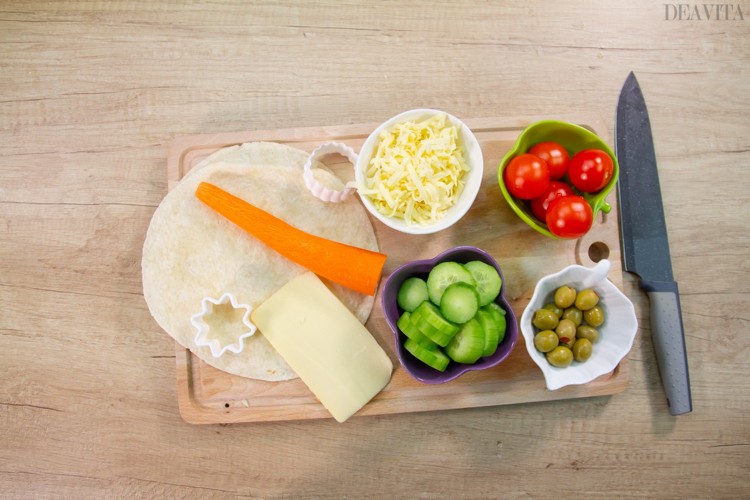 Tortilla Faces with vegetables and cheese ingredients
