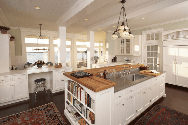 functional kitchen island with shelves and storage cabinets
