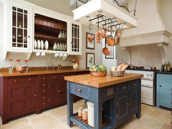 small kitchen island and pot rack with lighting